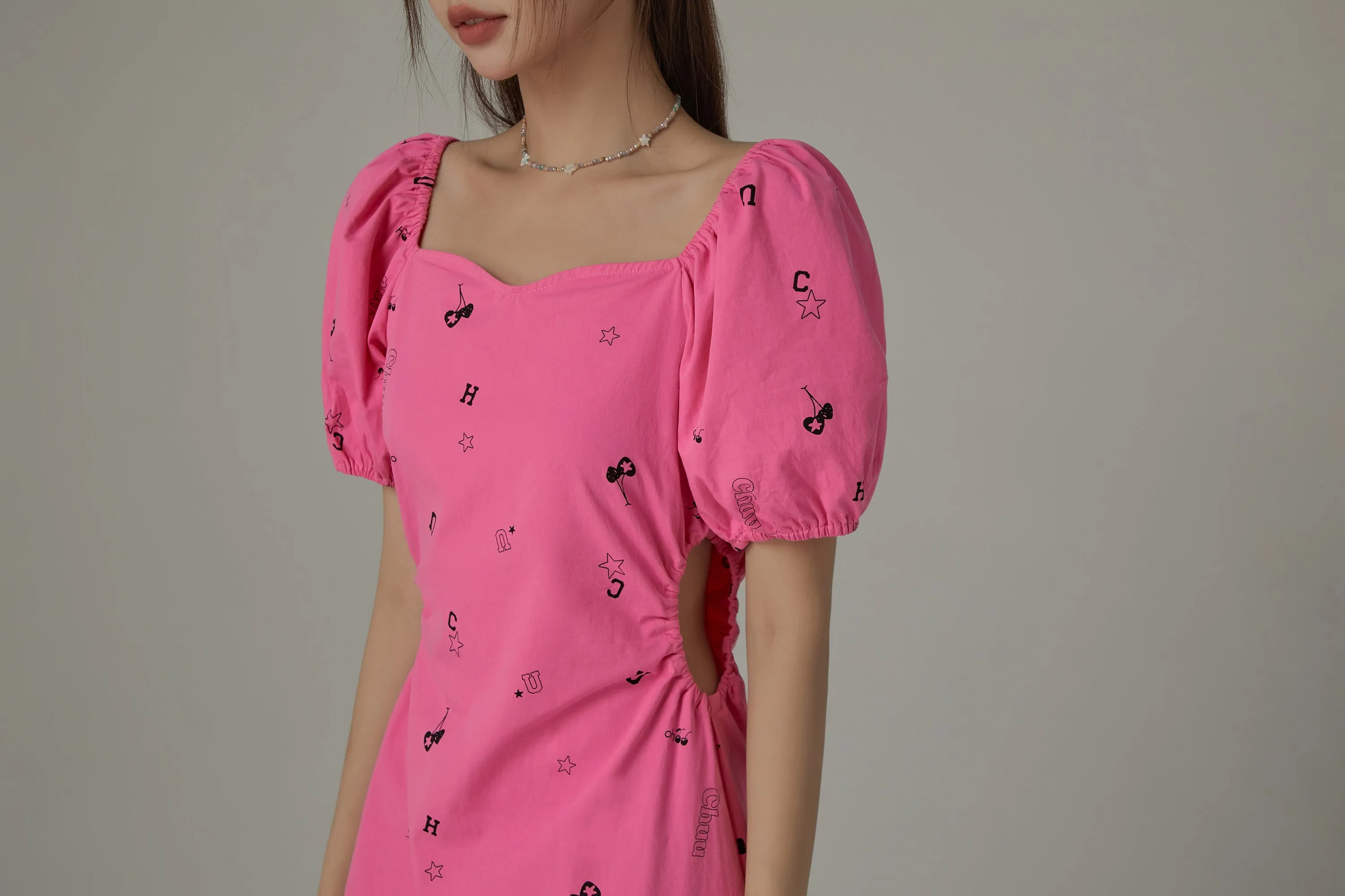 Chuu Symbols Ruffled Side Cutout Puff Short Sleeve Mini Dress